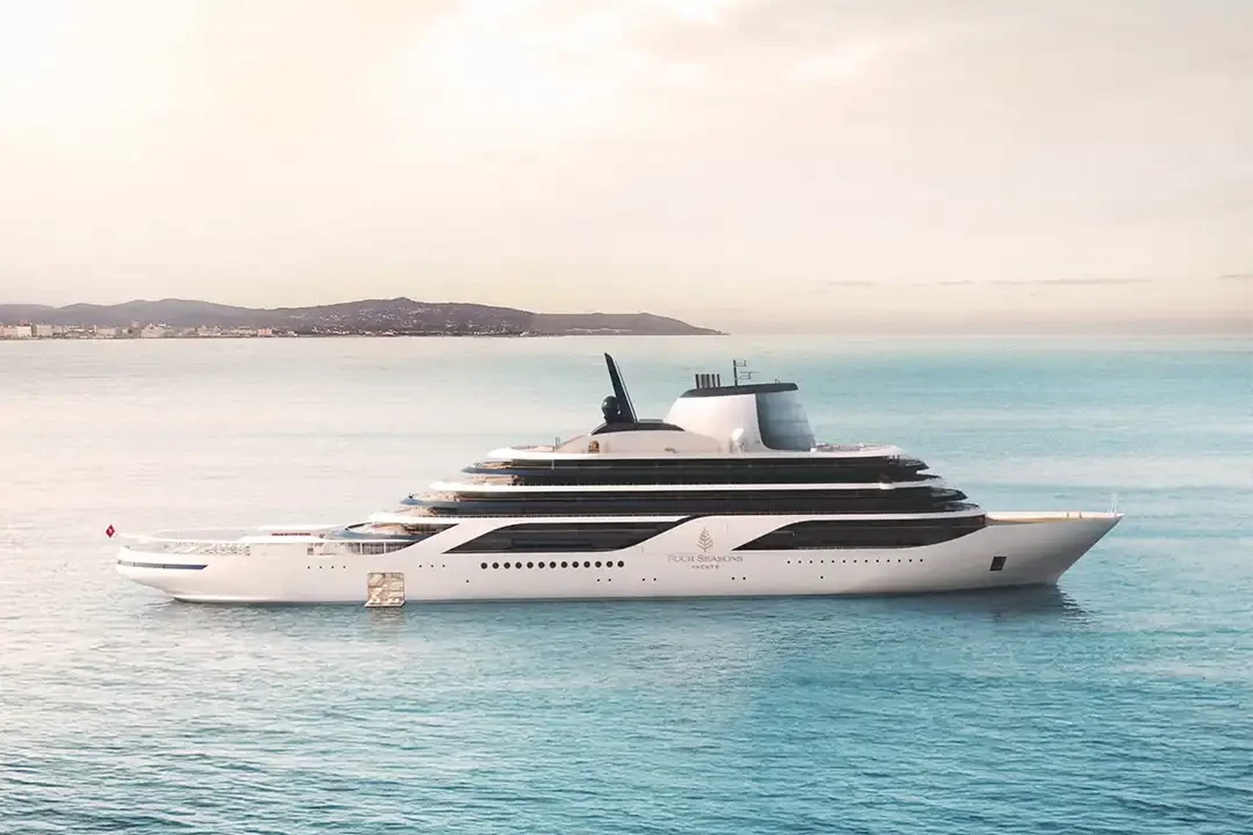 Four Seasons Yacht anchored in a tropical cove