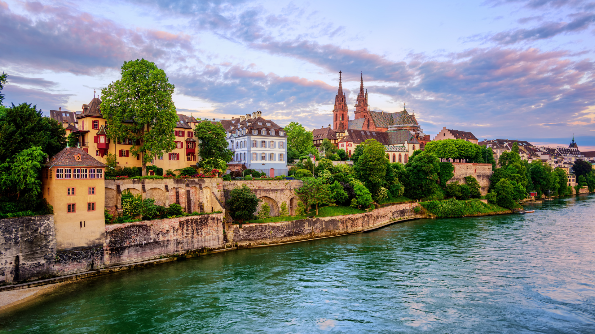 Rhine riverbank with cathedral and trees — AMA Waterways