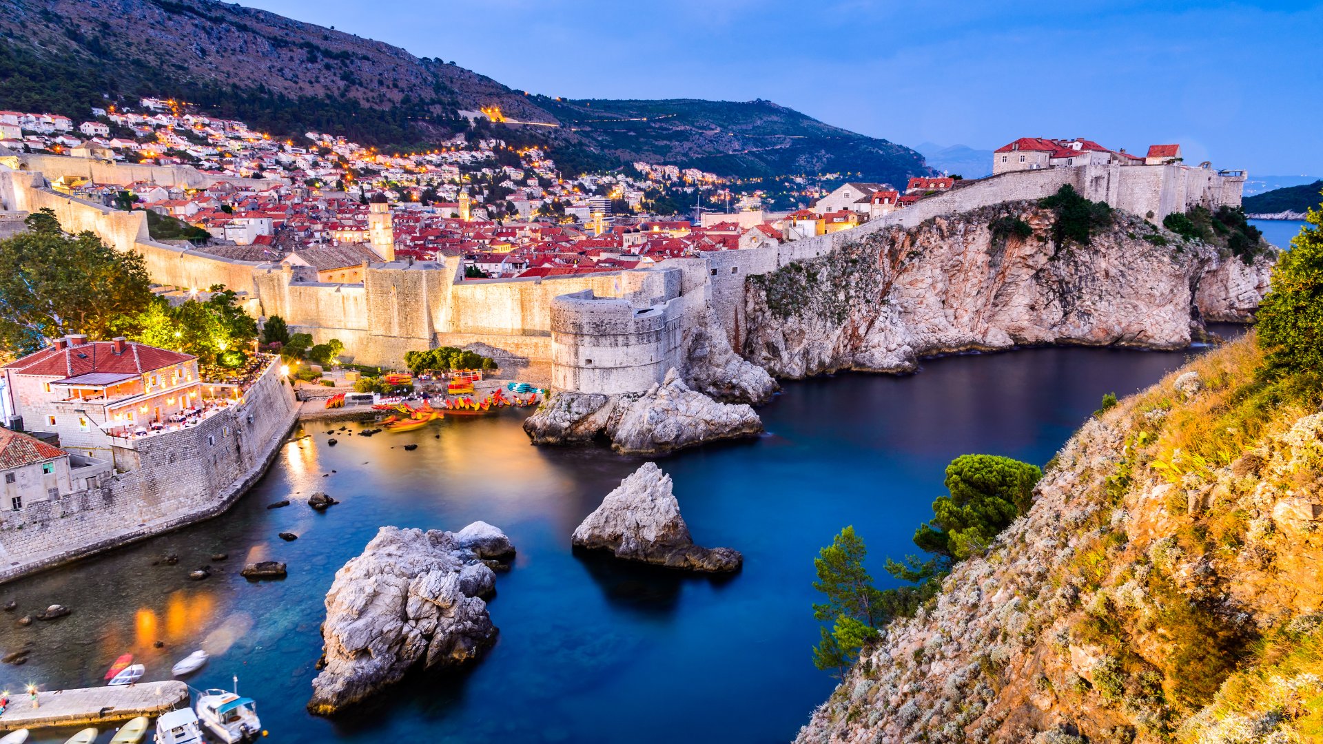 Dubrovnik Croatia — illuminated old city walls at dusk