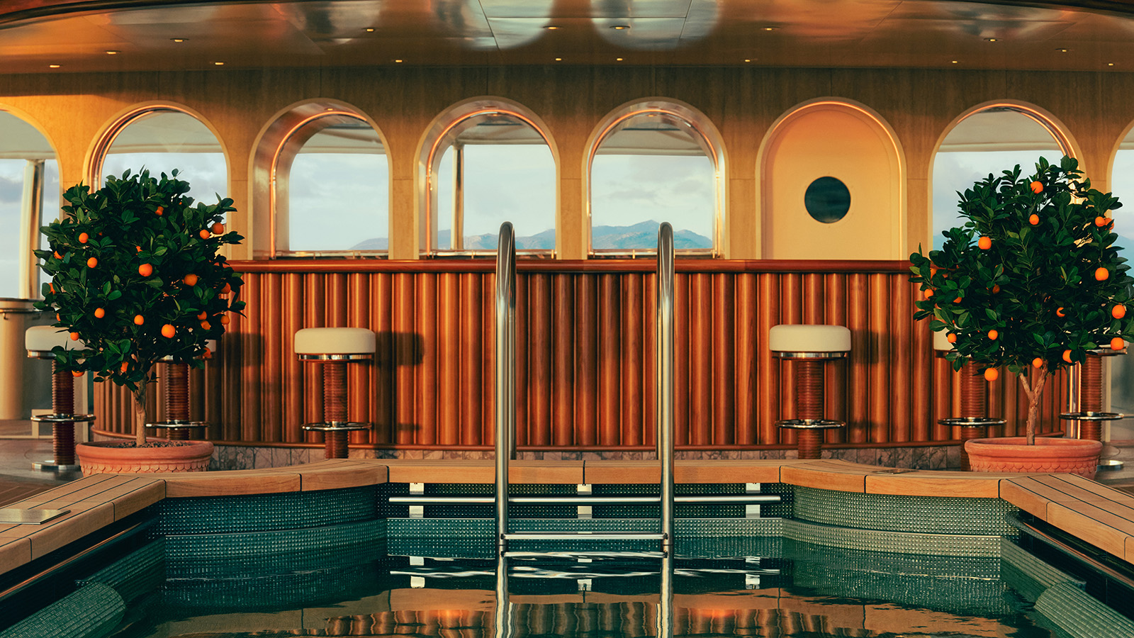 Four Seasons Yacht — Horizon Bar with copper-clad bar and arched windows over the Mediterranean