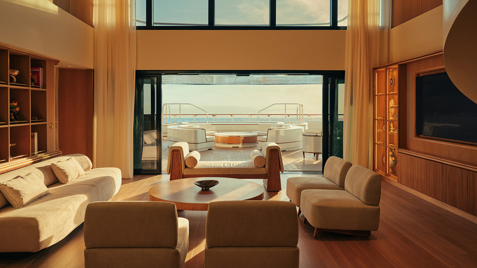Four Seasons Yacht — Loft Suite at golden hour with panoramic aft ocean terrace
