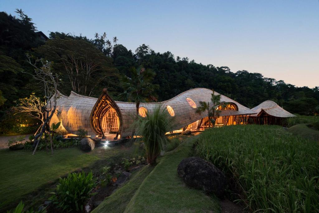 Mandapa Ritz-Carlton Reserve Ubud Bali luxury bamboo architecture — Sirena Collective