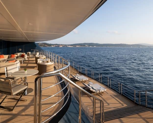 Waters edge deck aboard Ritz-Carlton Yacht Collection — Sirena Collective