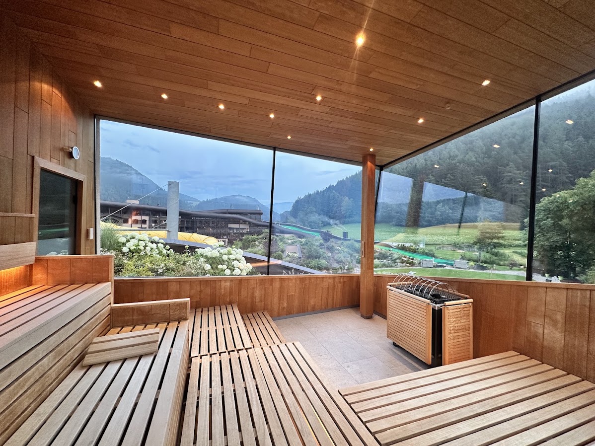Family sauna with panoramic Alpine views at Falkensteiner Family Resort Lido