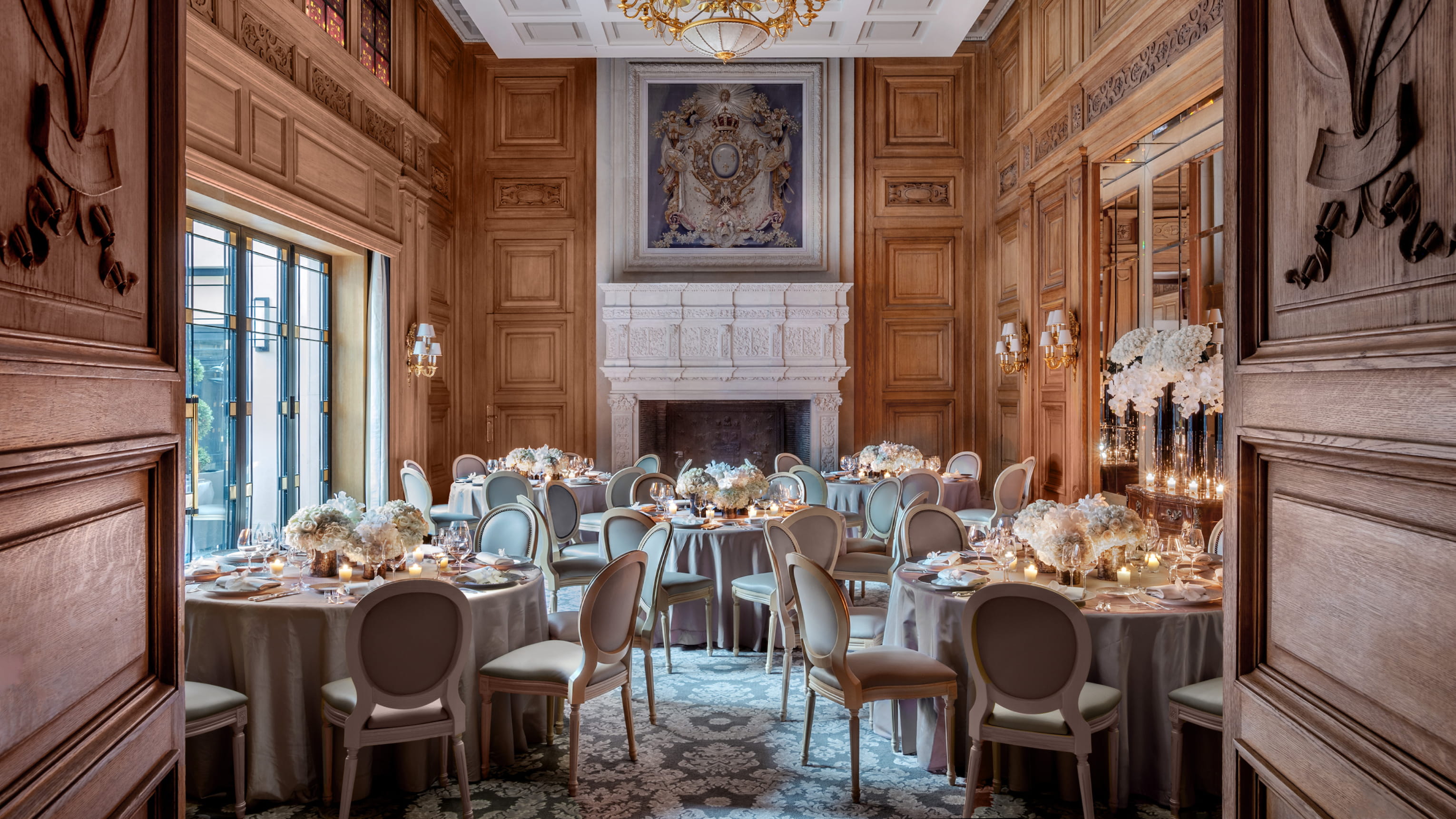 Salon Louis XIII private dining room with formal fireplace at Four Seasons Hotel George V in Paris